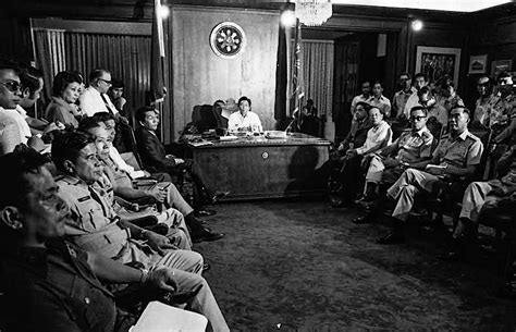 Martial law under Ferdinand Marcos .